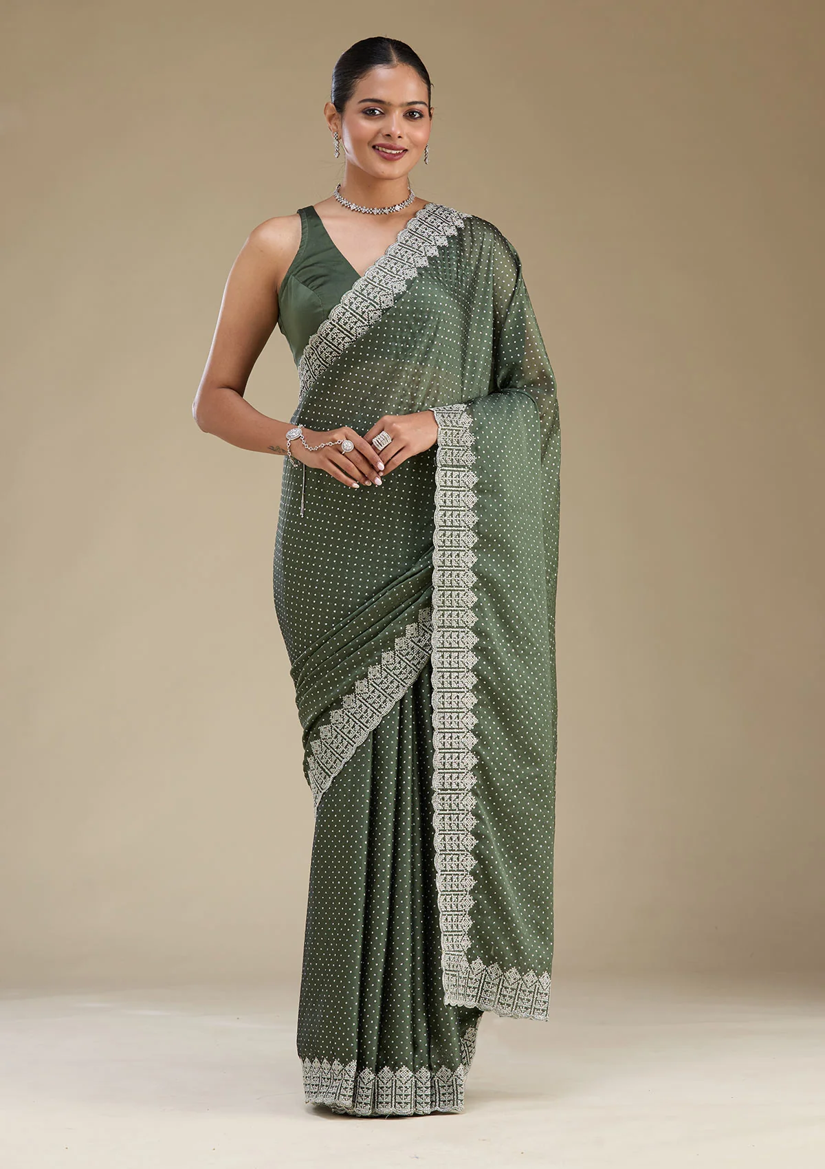 Mehendi green zariwork satin saree from the store catalogue